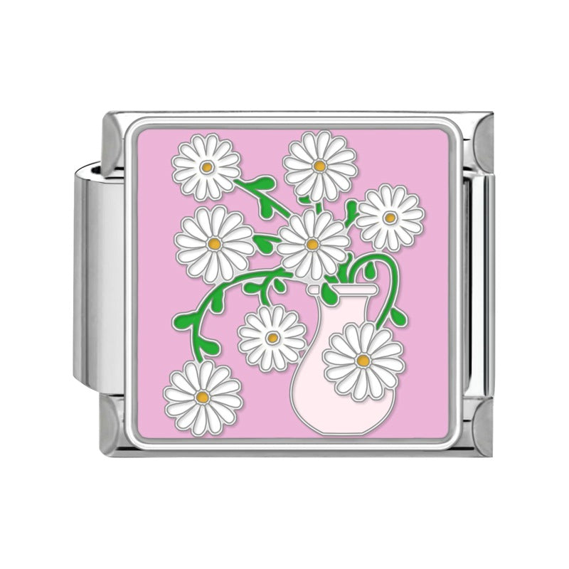 Pink vase with white daisies
